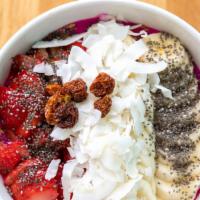 Dragon Bowl · base: dragon fruit, banana toppings: Almond granola, banana, strawberries, coconut flakes, f...