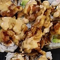 Cajun Roll (Spicy) · Soft Shell Crab Tempura, Crabmeat, Avocado, Eel Sauce, Sushi Rice, Wrapped with Seaweed Pape...