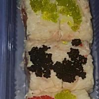 Ladybug Roll · Soybean Paper Wrapped with Crabmeat, Tuna, Avocado, Salmon,
Tobiko, Ponzu Sauce.