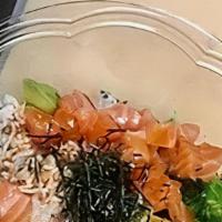 Salmon Bowl · Salmon, crabmeat, pineapple, avocado, onion, sesame seed, seaweed salad, dry nori, with poke...