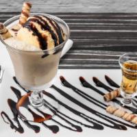 Affogato · Fresh espresso coffee with ice cream, amaretto, on a chocolate rim glass with cookie crumbs.