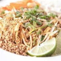 Pad Thai · Shallot, tamarind sauce, red onion, green onion, roasted peanuts, egg, baked tofu and beans ...
