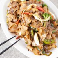 Drunken Noodles · Spicy. Flat rice noodles with tomatoes, bell peppers, broccoli, onion and chili. Topped with...