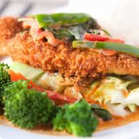 Filet Of Sole · Deep fried white fish with red curry sauce. Served with steamed vegetables and steamed rice.