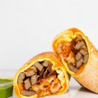 Bacon, Sausage, Egg, And Cheddar Breakfast Burrito · 3 fresh cracked cage-free scrambled eggs, melted Cheddar cheese, bacon, Italian link sasuage...