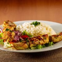 Chicken Kabob Platter · Marinated Chicken Breasts with Savory Spices, Cooked to perfection, served with rice, hummus...