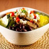 Greek Salad · Plum tomatoes, Greek olives, banana peppers and sweet red onions atop of romaine lettuce and...