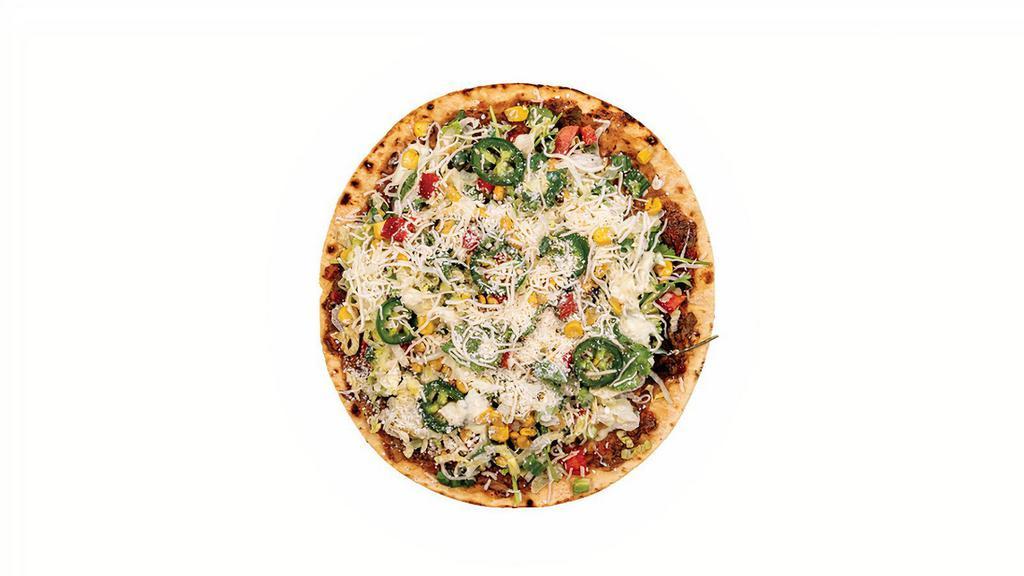 Rio Grande · black bean & corn blend, spread on thin lavash bread topped with shredded lettuce, roasted corn, tomatoes, roasted red peppers, jalapeños, scallions, cilantro, cotija & jack cheeses and drizzled with lime crema