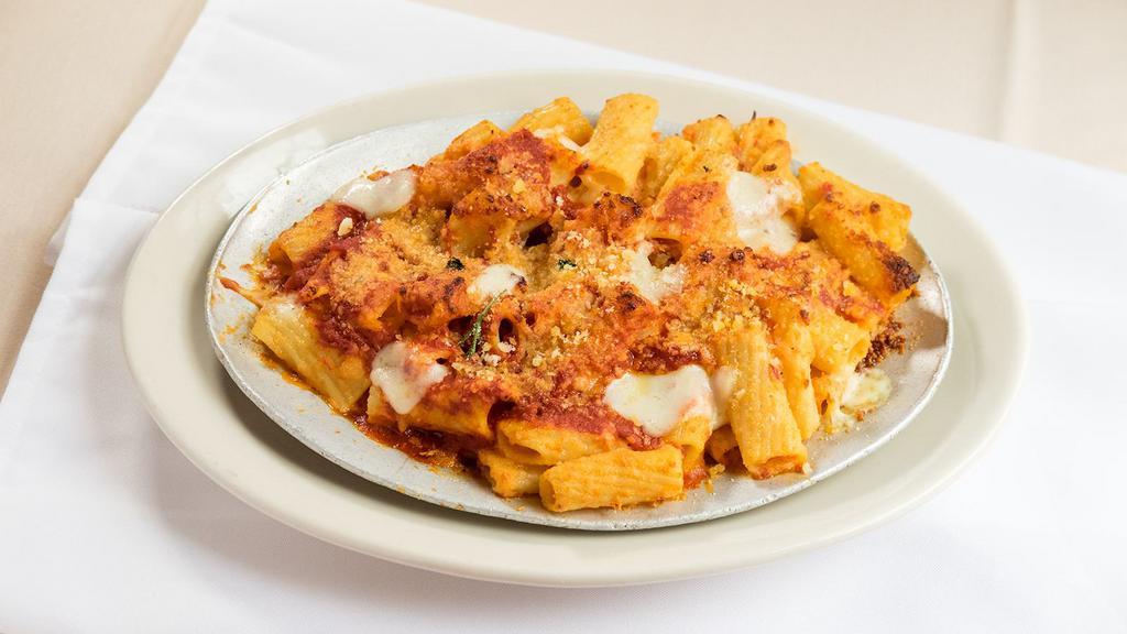 Baked Rigatoni · Imported Italian semolina rigatoni tossed with mozzarella and provolone cheeses, topped with tomato sauce and grated parmesan cheese and baked to perfection.