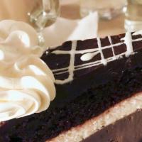 Chocolate Mousse Cheesecake · An oreo cookie crust topped with layers of chocolate cheesecake and rich, silky smooth milk ...
