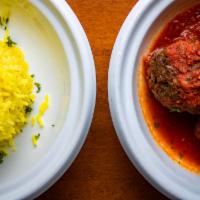 Kefta Tagine · braised lean ground beef meatballs, house spice, herbs, garlic-tomato sauce served with rice...