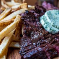 Steak Au Poivre · 7-ounce snake river farms wagyu skirt steak, herb butter, au poivre sauce, served with our h...