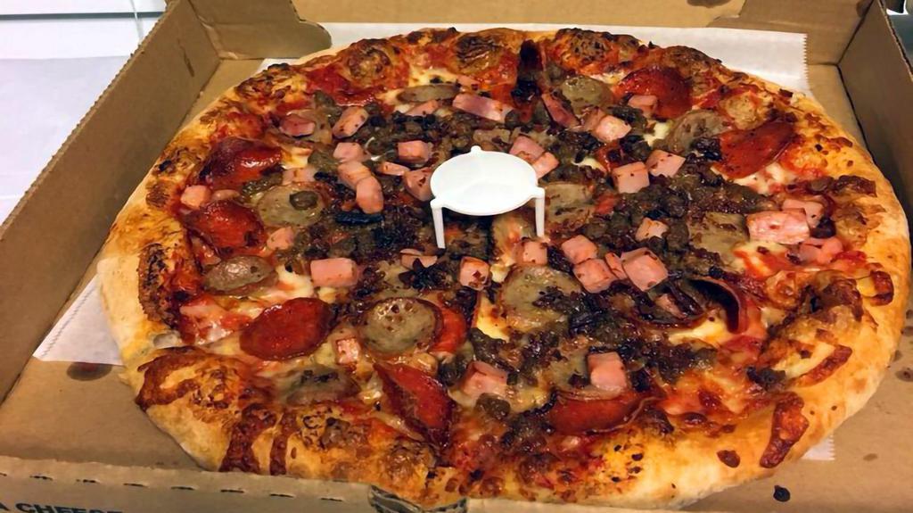 Meat Lover'S · Pepperoni, ham, ground beef, bacon, Italian sausage and mozzarella cheese.