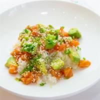 Salmon Poke Bowl · Salmon, Sushi Rice, Avocado, Beets, Radish, Papaya Salad Rice Pearls