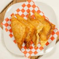 Crab Rangoon (4 Pcs Large) · Four pieces crab and cream cheese wrapped in wonton paper.