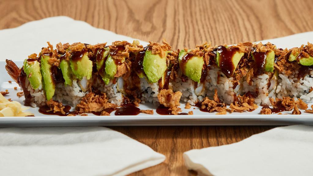 Philly Crunch Roll · Tempura shrimp, cream cheese, crab meat, cucumber topped with avocado, onion crunch, and eel sauce.