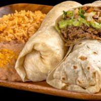 Two Carne Asada Burritos · 2 carne asada burritos with guacamole and pico served with rice and beans.