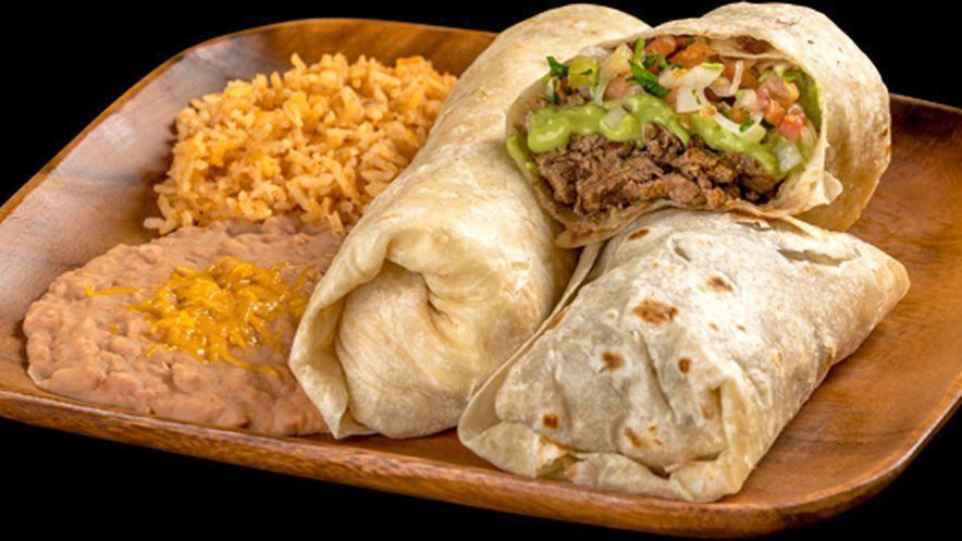 Two Carne Asada Burritos · 2 carne asada burritos with guacamole and pico served with rice and beans.