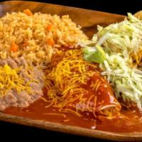 Taco And Enchilada · Shredded beef taco with lettuce and cheese and a cheese enchilada with lettuce served with r...