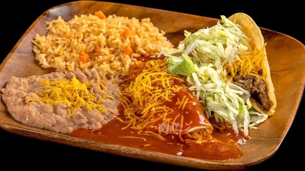 Taco And Enchilada · Shredded beef taco with lettuce and cheese and a cheese enchilada with lettuce served with rice and beans.