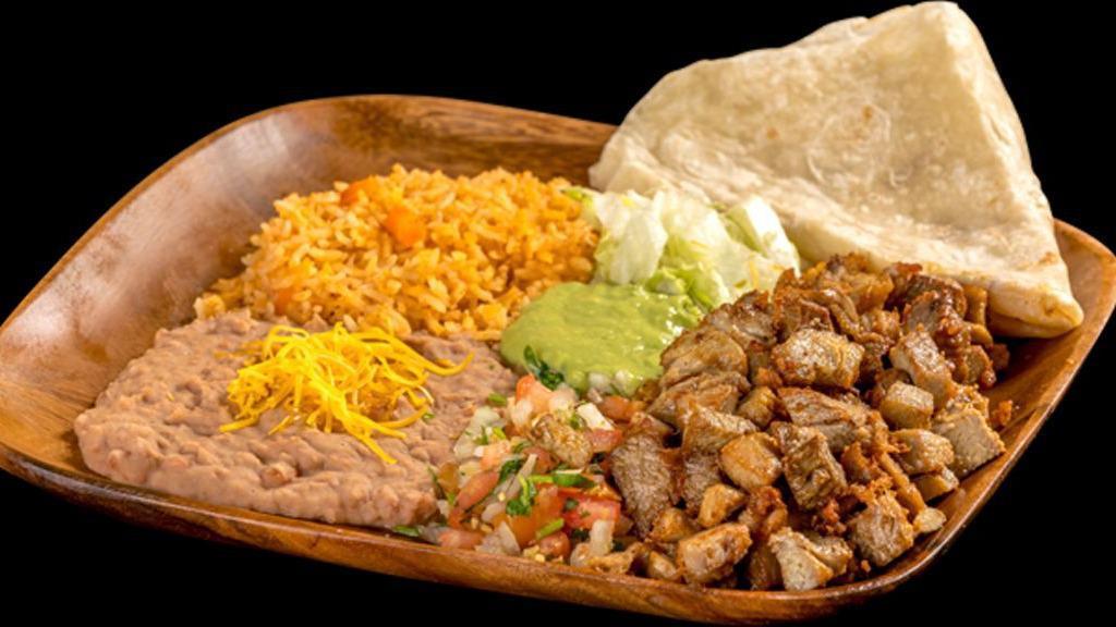 Carnitas Plate · Pork meat served with guacamole, pico de gallo, lettuce, rice, and beans.
