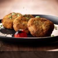 Sodwana Bay Cakes · Coastal South African style crab and Atlantic cod cakes served with a zesty peppadew rémoula...
