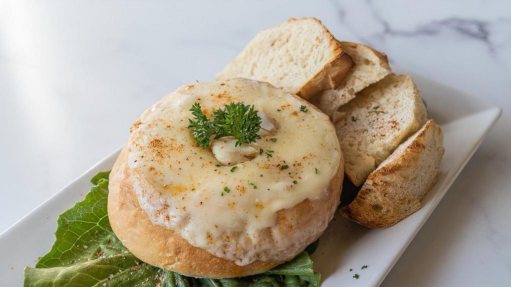 Crab Dip · Creamy dip stuffed in a bread boule.