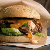 Classic Hamburger · Typical Classic Hamburger with a single beef patty, ketchup, mayonnaise,  lettuce, tomatoes ...