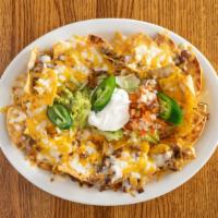 Cheese Nachos · Tortilla chips covered with melted cheese, pinto beans, guacamole, sour cream, and pico de g...