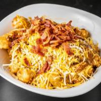 Loaded Tater Tots · Serving of tots covered with chili and cheese. Served with ketchup or ranch.
