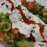 Falafel Salad · Chick Pea Patties, Lettuce, Tomato, Parsley, Tzatziki or Hummus
