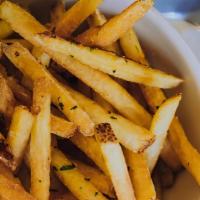 Truffle Fries · house fries with black truffle oil and parmesan. served with garlic aioli