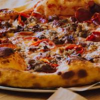 The Capitol · pepperoni, fennel sausage, bacon lardons, fire roasted peppers, fresno