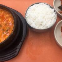 Sundubu Jjigae · Spicy stew containing soft tofu and clams.