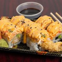 American Dream Roll · Hot and spicy. Shrimp tempura, avocado inside, top with spicy crab and spicy mayo sauce.