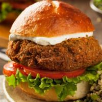 Tzatziki Burger · Prime Chuck Sirloin burger with fresh Tzatziki sauce, cheese, onions, lettuce and tomato. Se...