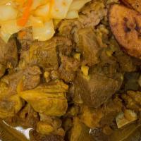 Curry Goat (Large) · Curry goat, served with white rice or rice and peas.