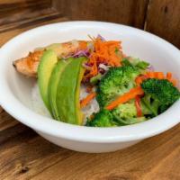 Grilled Salmon Bowl · served with teriyaki sauce. topped with shredded carrots • broccoli • fresh avocado • red ca...
