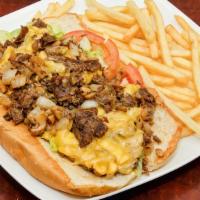 Philly Cheesesteak · Lettuce, Tomatoes, Grilled Onions, Mushrooms, Jalapeno Peppers, Provolone Cheese, Mayonnaise.