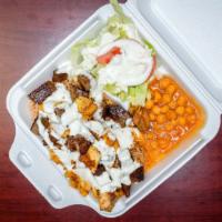 Combination Rice · Grilled Chicken and Lamb served over brown rice with a side of chickpeas and salad and white...