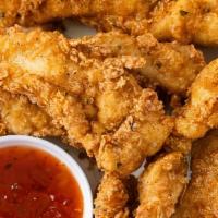 Chicken Tender Basket · Four pieces. All baskets served with a side of your choice, fries, onion rings, sweet potato...
