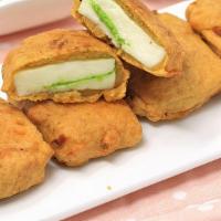 Paneer Pakora · Cottage cheese marinated and dipped in spices, battered and fried until golden brown.