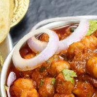 Chole Bhature · A combination of spicy and flavored Chana Masala with Bhature (fluffy deep-fried leavened br...