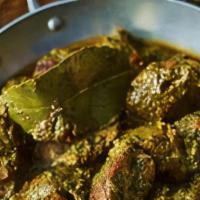 Lamb Saag · Lamb cubes cooked with fresh spinach in a blend of Indian spices.