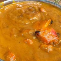 Chicken Tikka Masala · Chicken breast cubes skewered in tandoor and simmered in tomato onion cream with cashew nut ...