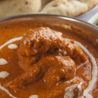 Chicken Makhani · Chicken breast cubes cooked in a mild creamy tomato gravy.
