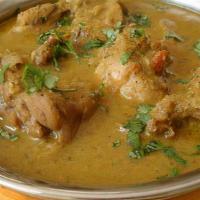 Chicken Nilgiri Korma · Chicken breast cubes cooked with fresh cardamom, cilantro and onion cream gravy.