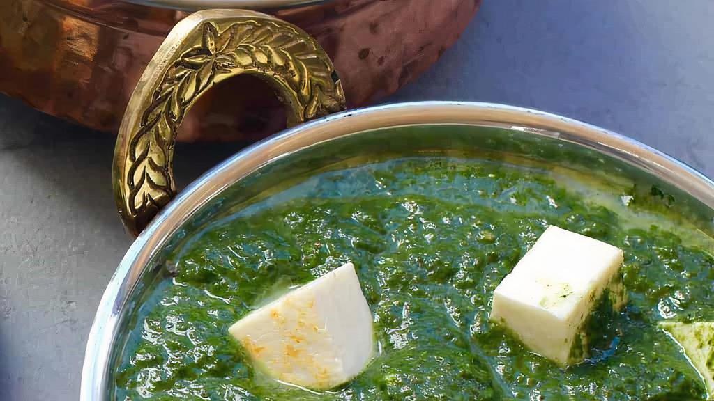 Palak Paneer · Farmer cottage cheese cooked with fresh spinach