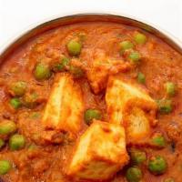 Mutter Paneer · Green peas and cottage cheese cubes cooked in a creamy sauce.