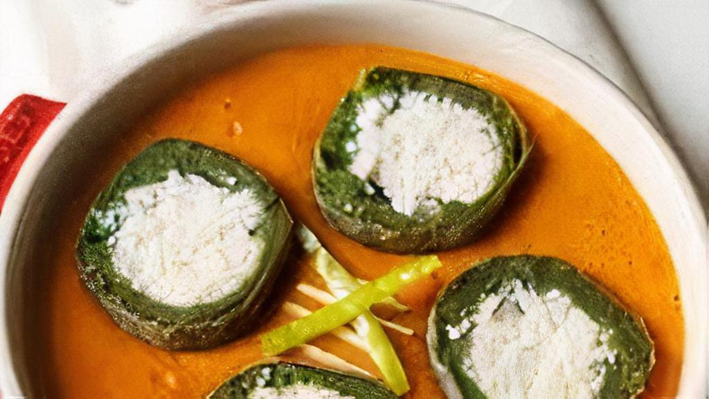 Shaam Savera · Fresh spinach and cottage cheese dumplings cooked in a velvety tomato and onion cream gravy.